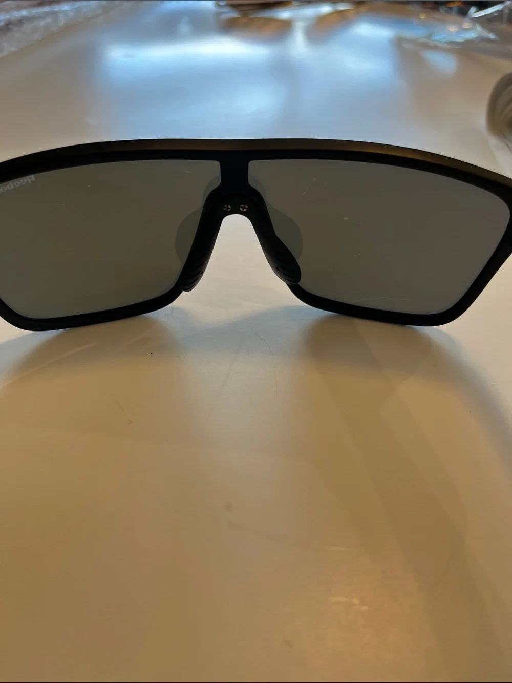 Reebok Black Frame Sunglasses with Red-Gold Mirrored Lens